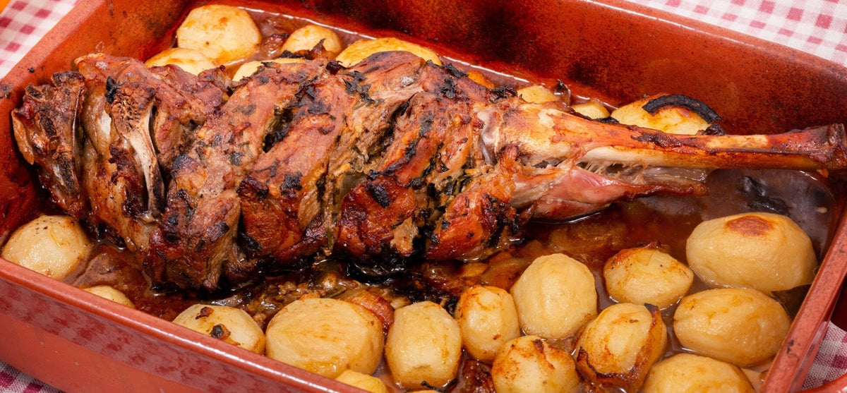 Oven-roasted lamb shoulder with potatoes