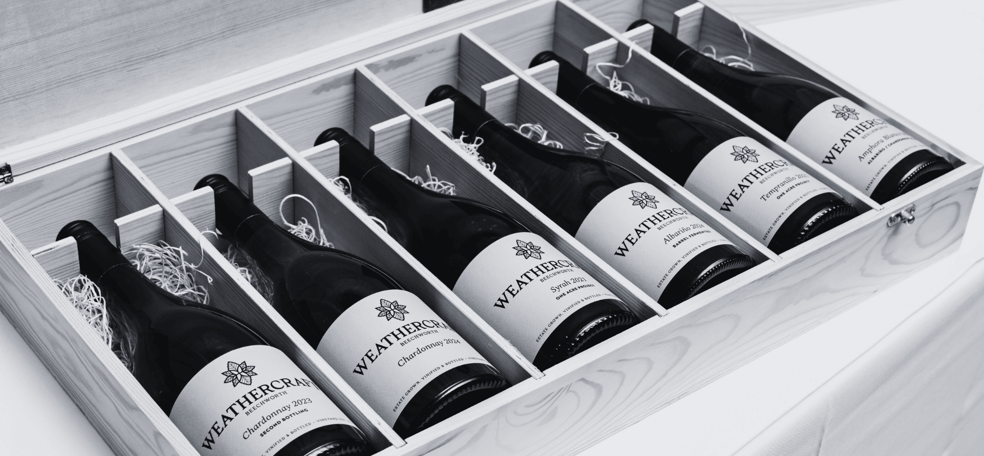 Box of Weathercraft Wine Bottles on Display